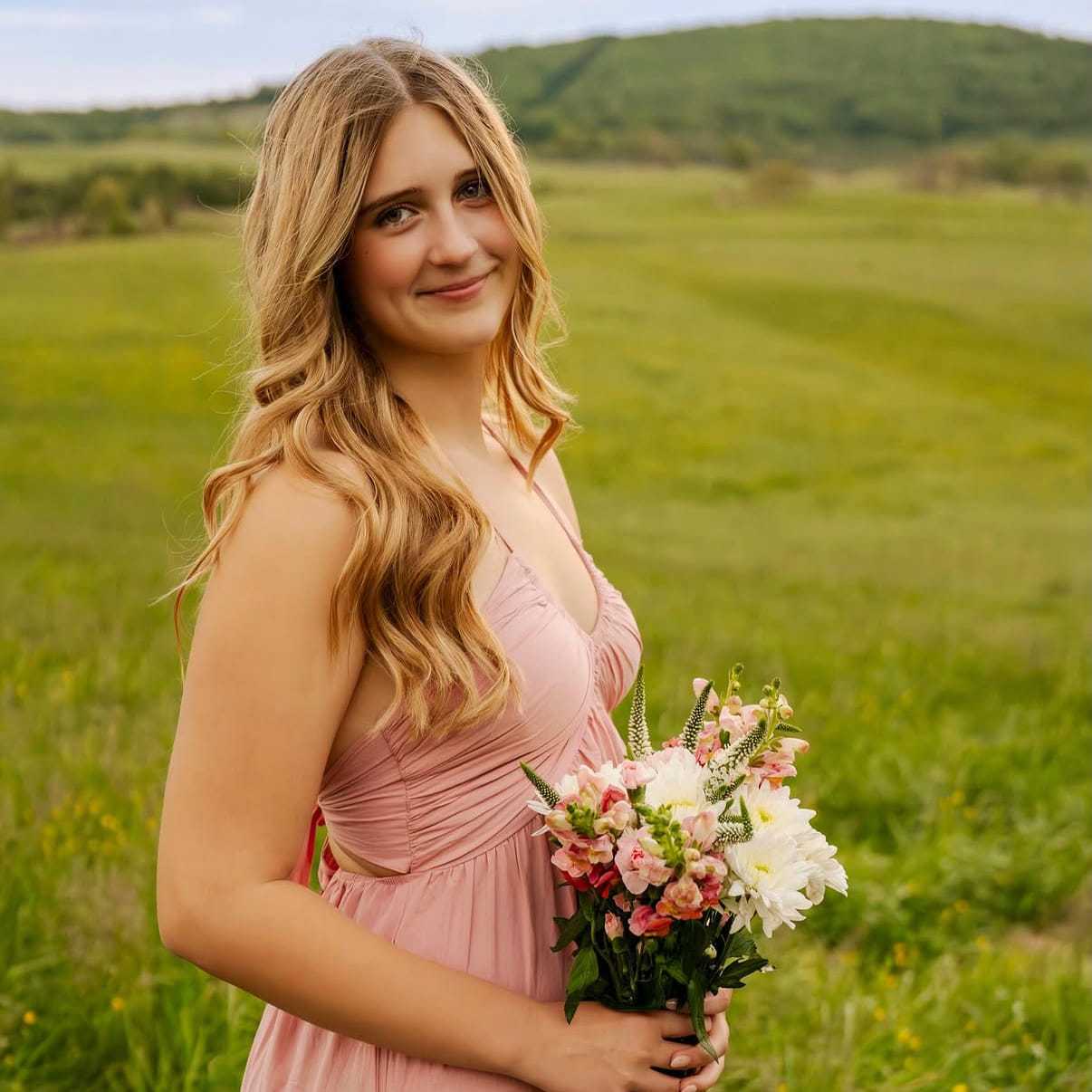 Portrait of Colleen Mathews, a professional stylist at Salon Khouri, showcasing their expertise and style.