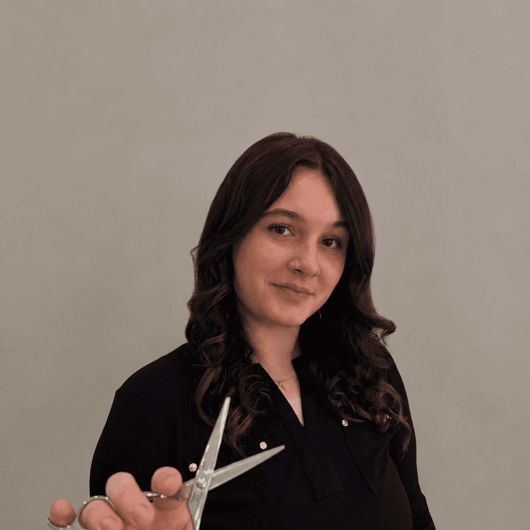 Portrait of Tabitha Lawson, a professional stylist at Salon Khouri, showcasing their expertise and style.