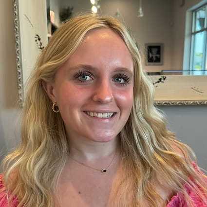 Portrait of Allie Bilgere, a professional stylist at Salon Khouri, showcasing their expertise and style.