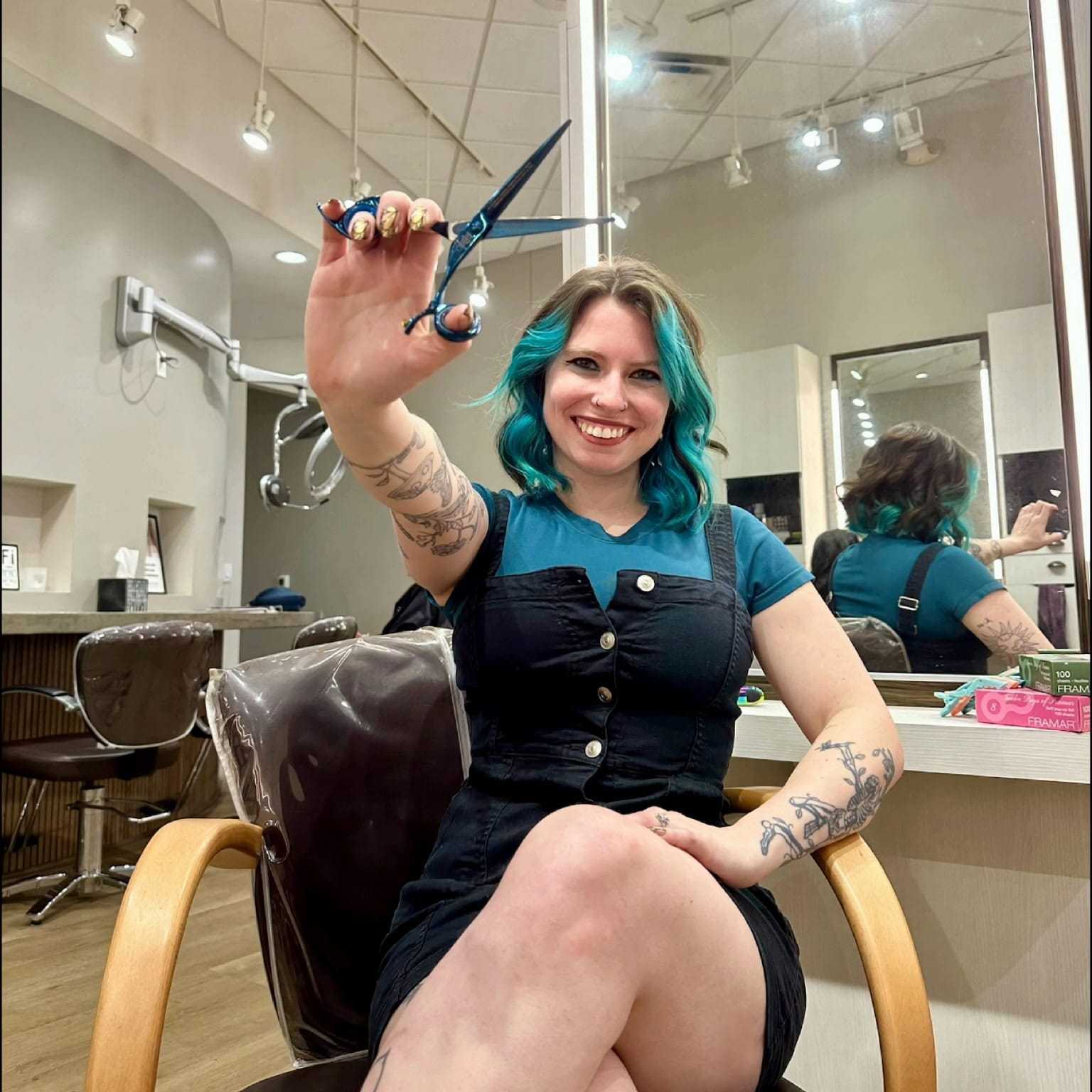 Portrait of Olivia Hamblin, a professional stylist at Salon Khouri, showcasing their expertise and style.